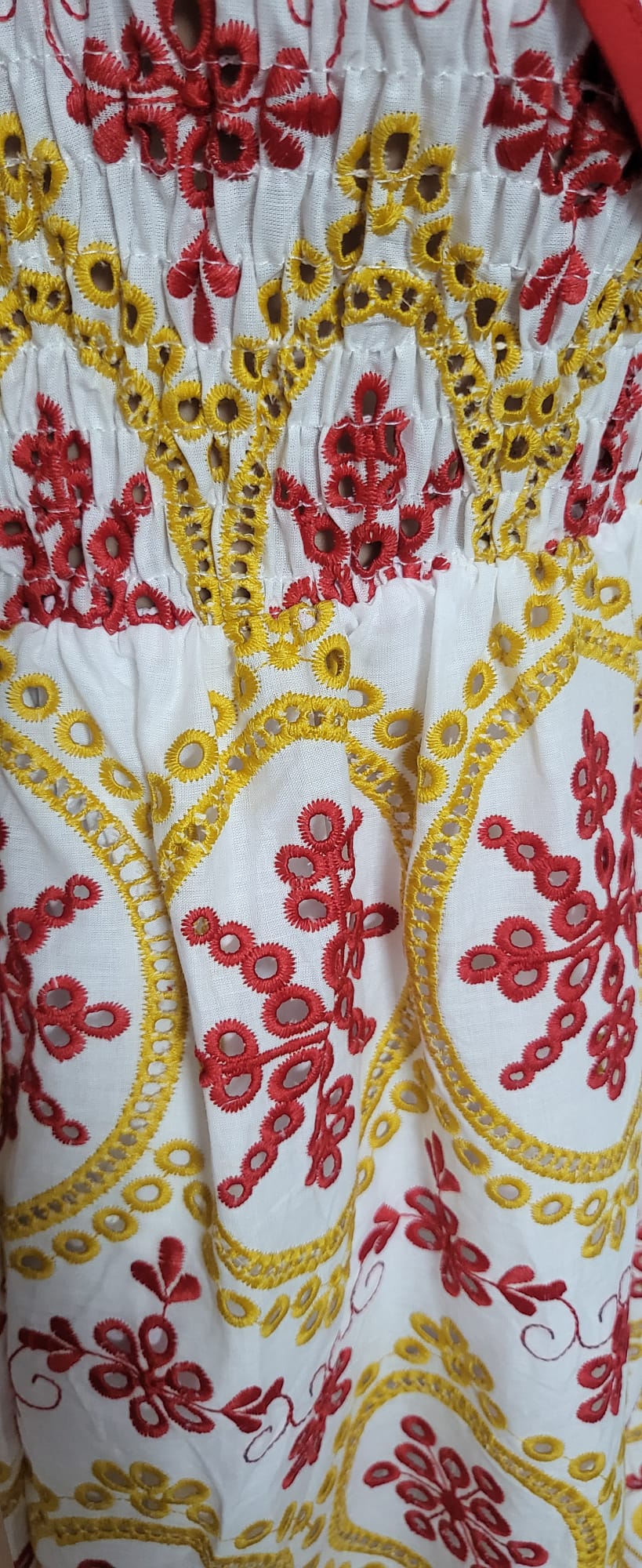 sexy yet elegant dress in delicate red and gold embroidered lace.