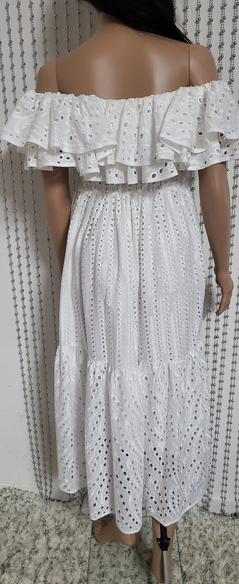 White embroidered lace dress.