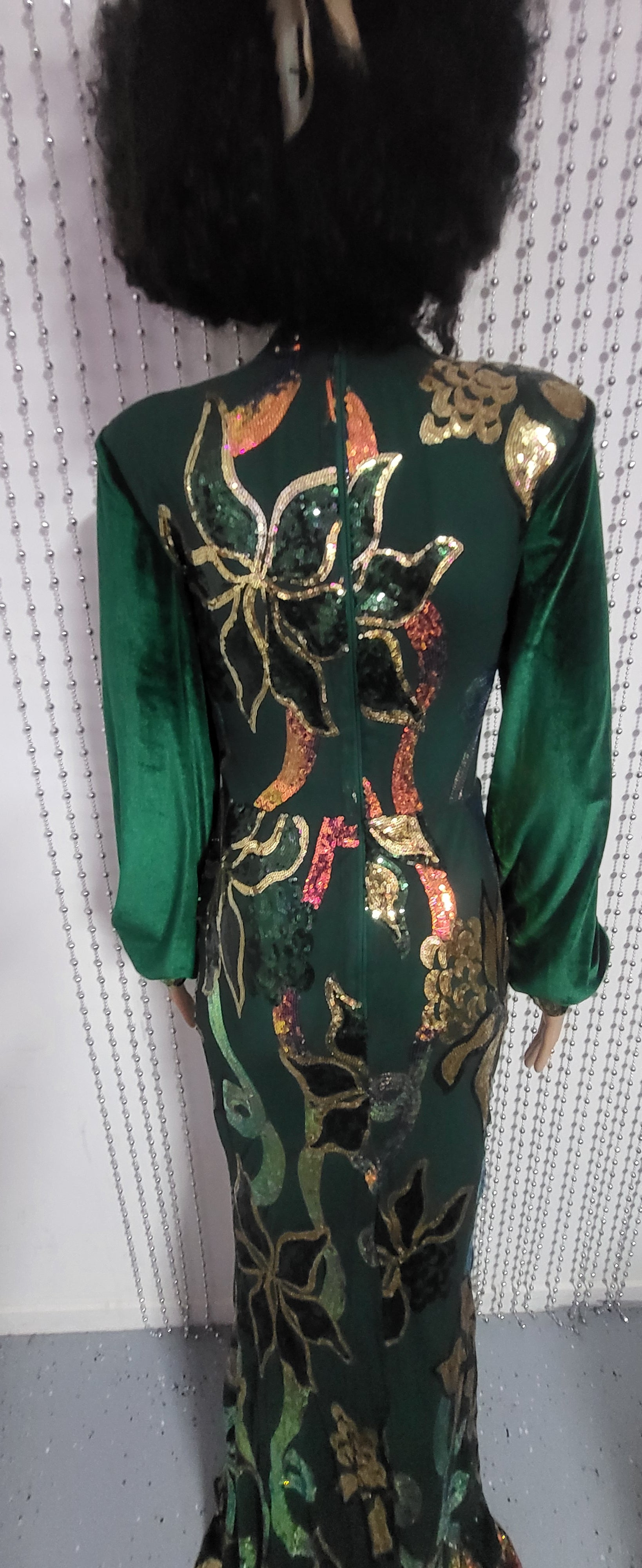 Green full sleeve sweetheart neck mermaid sequin long elegant evening dress .