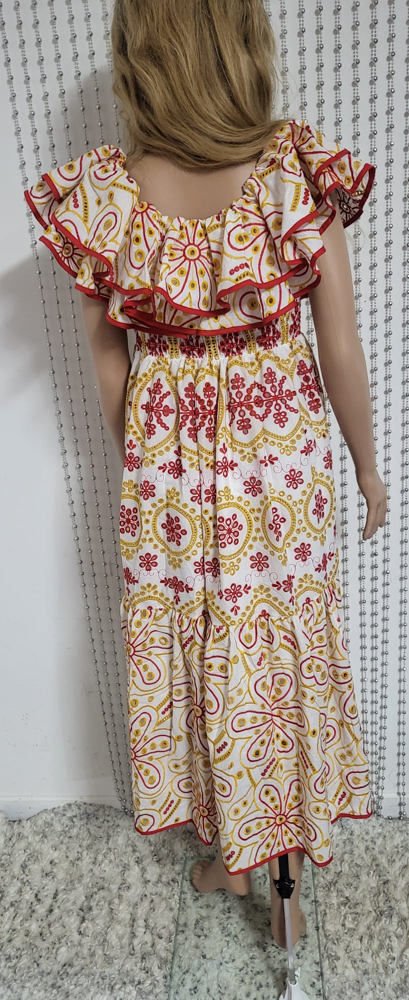 sexy yet elegant dress in delicate red and gold embroidered lace.