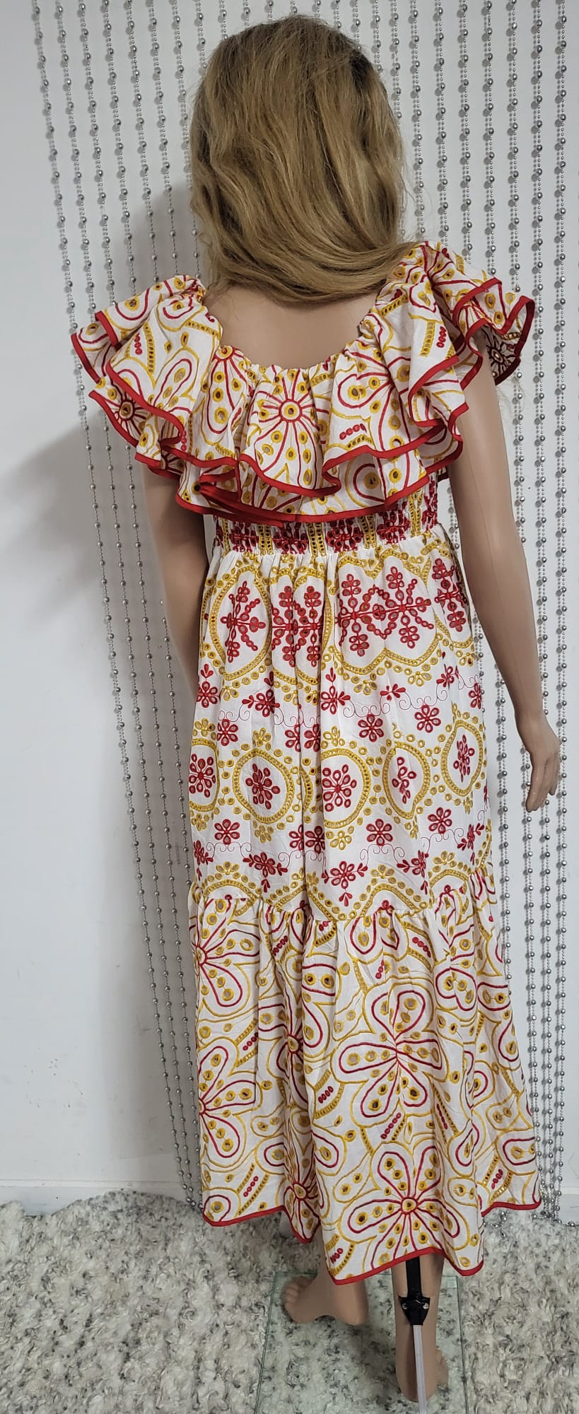 sexy yet elegant dress in delicate red and gold embroidered lace.