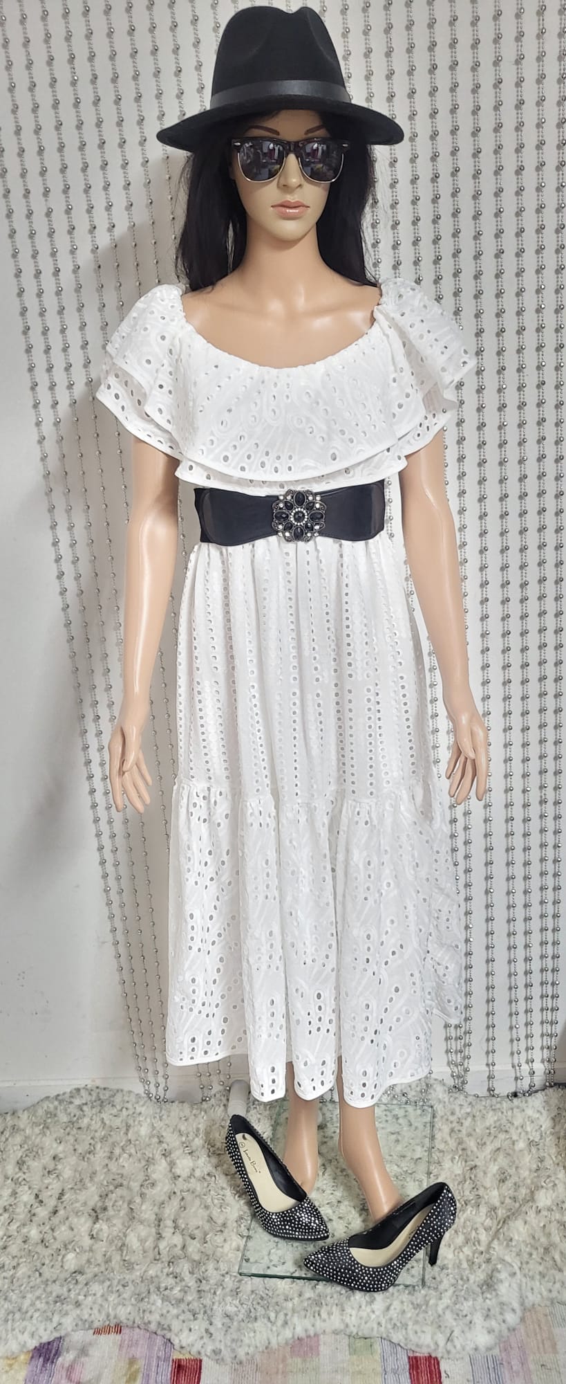 White embroidered lace dress.