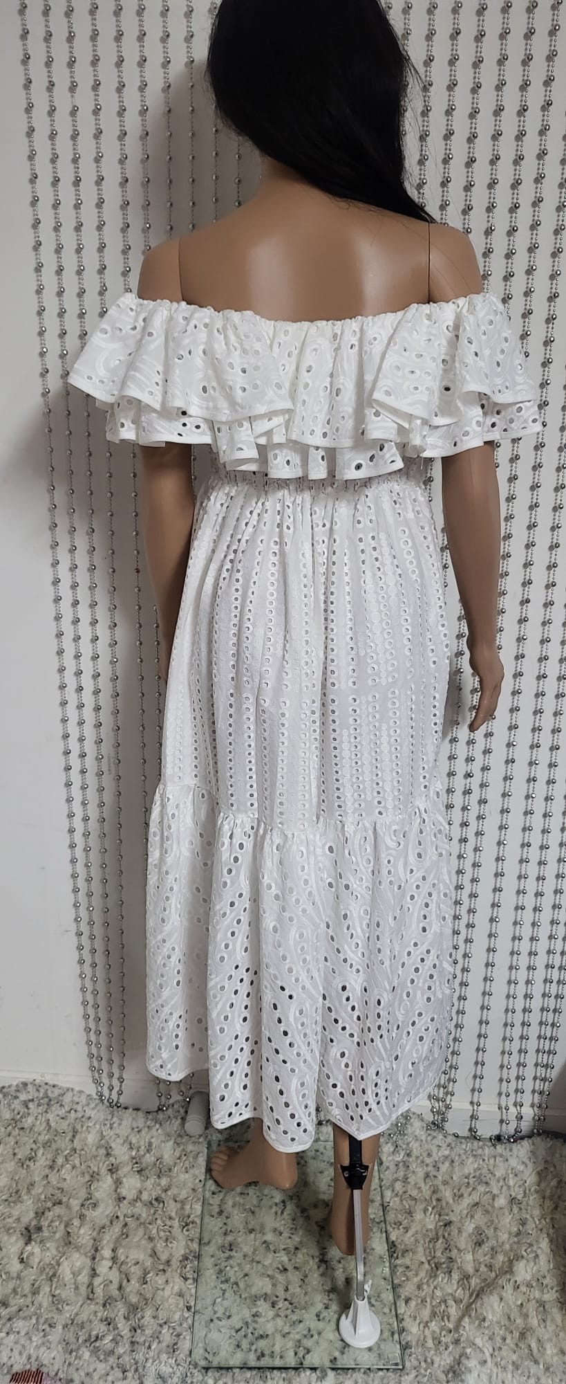 White embroidered lace dress.