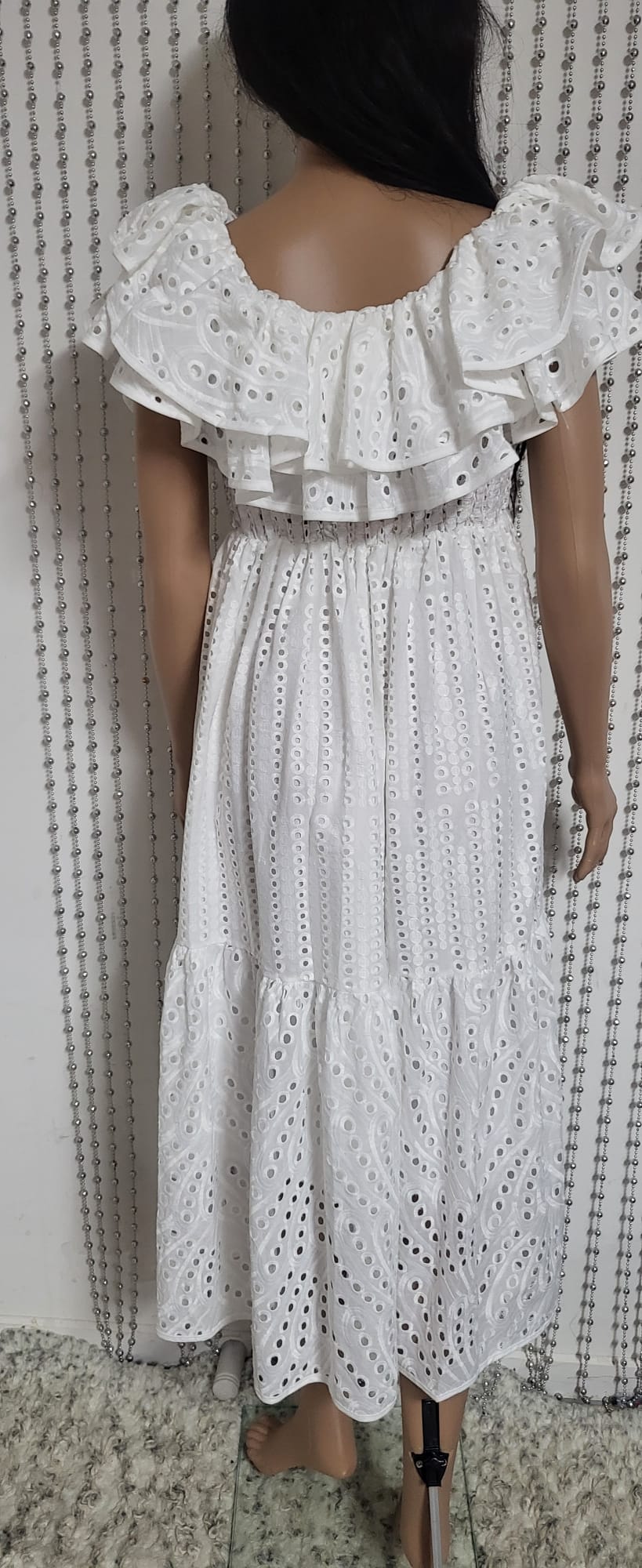 White embroidered lace dress.