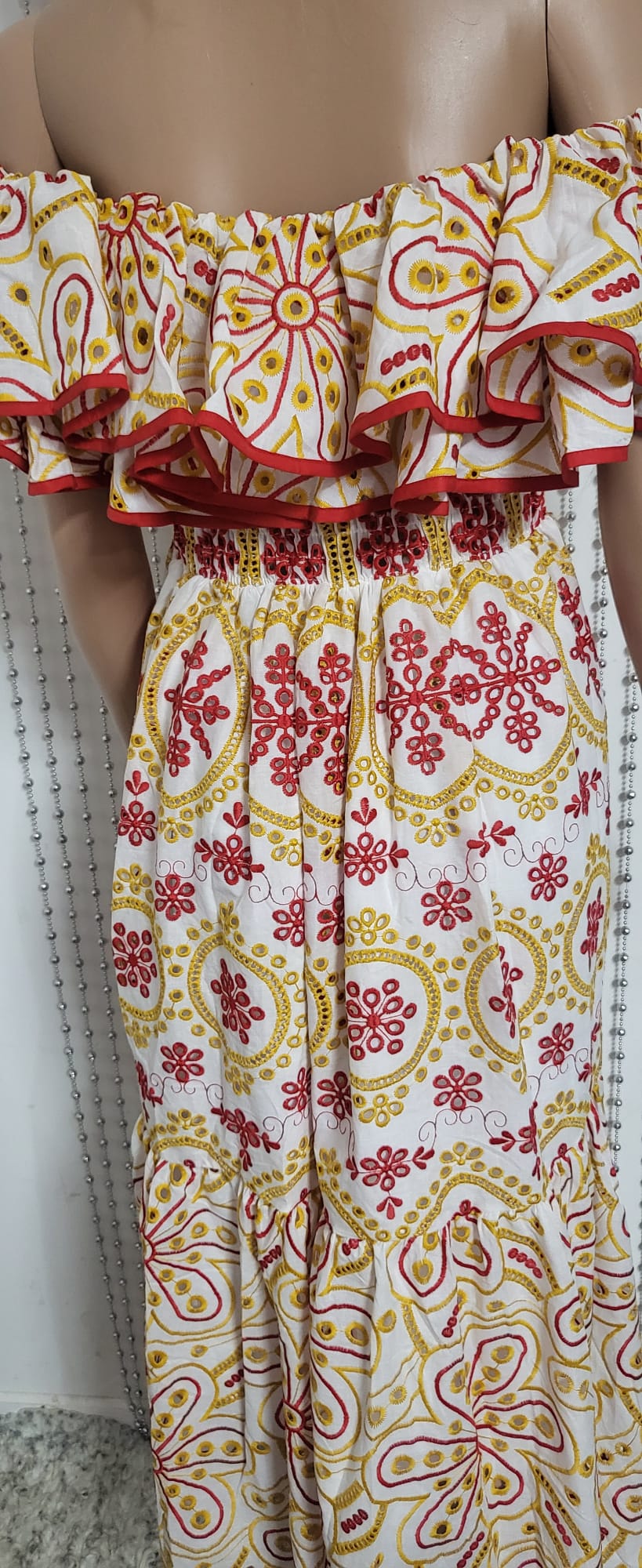 sexy yet elegant dress in delicate red and gold embroidered lace.