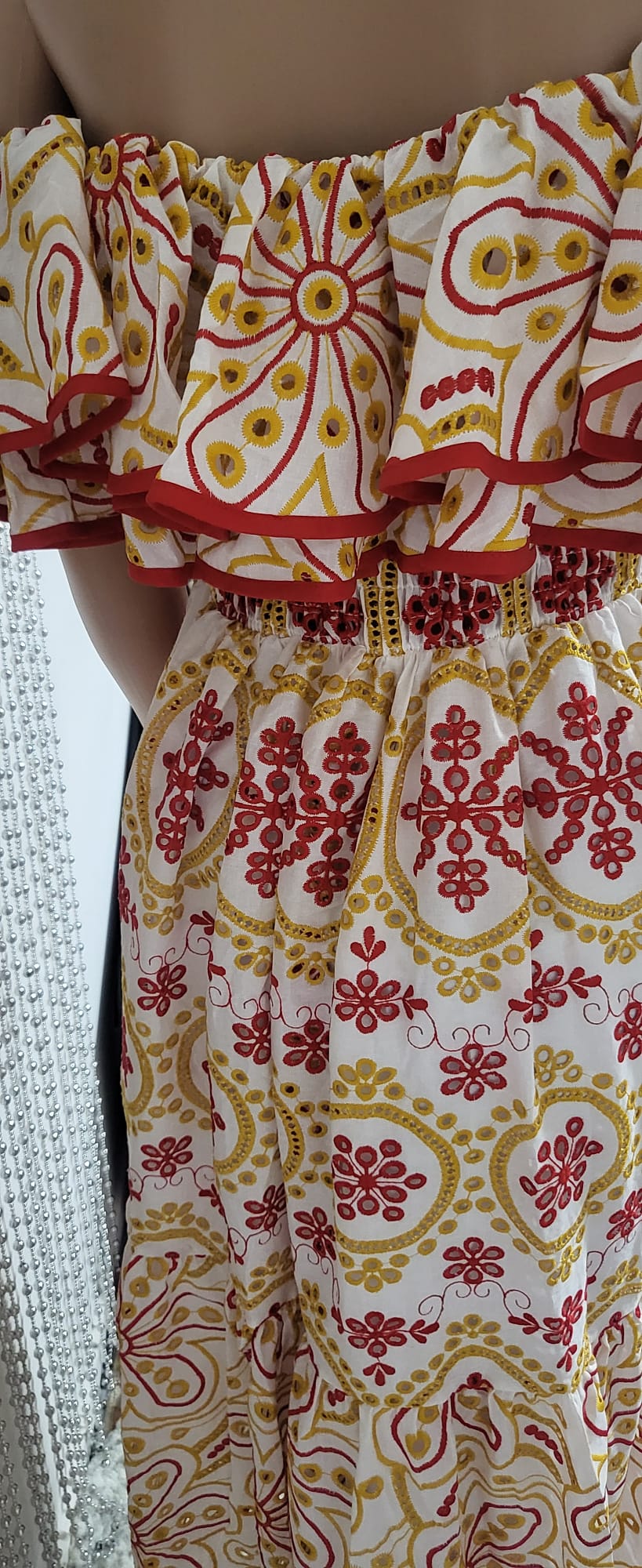 sexy yet elegant dress in delicate red and gold embroidered lace.