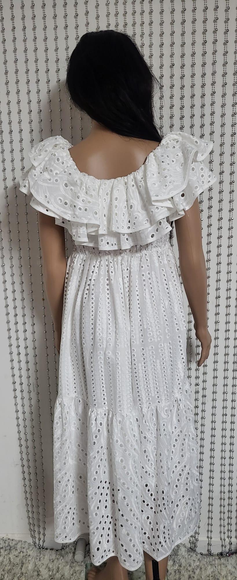 White embroidered lace dress.
